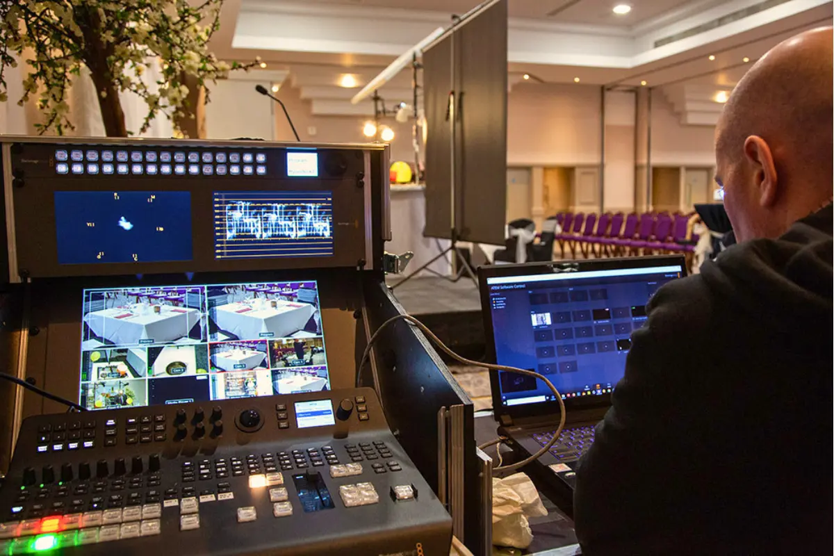 Mobile broadcast studio setup with multi-camera switcher and streaming controls at a live event in Sligo