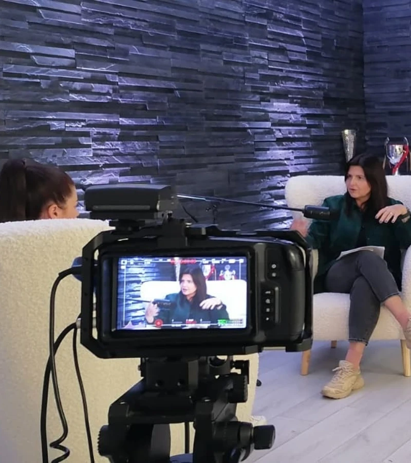 two guests recording a podcast in StudioRove's mobile podcast studio