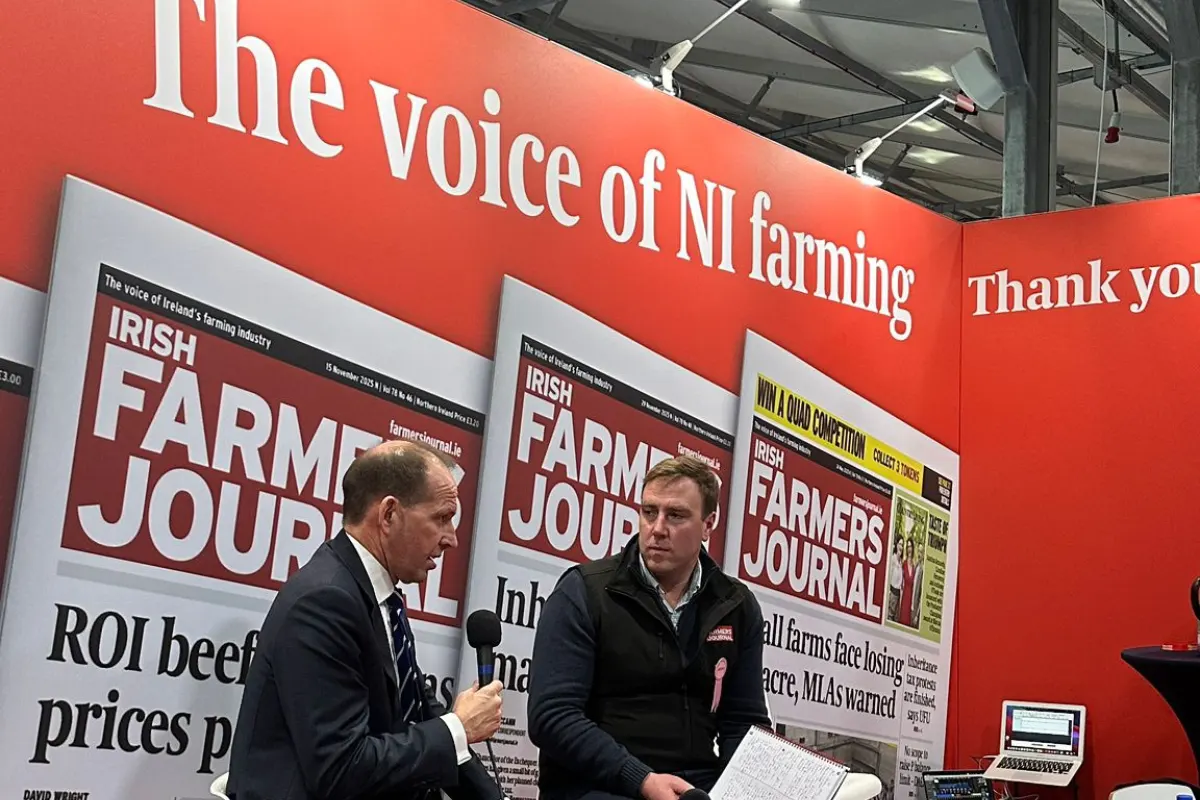 Two men during an on-location video podcast recording session at an Irish Farmers Journal farming exhibition stand