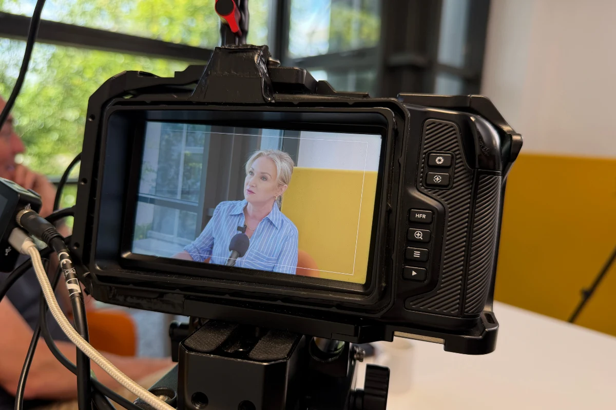Camera monitor showing a guest during a podcast recording in Sligo